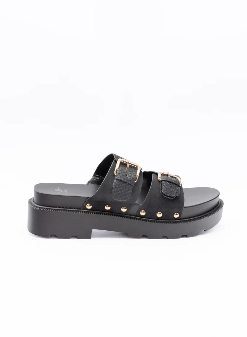 باتا صنادل سلايد بنعل مرتفع وتفاصيل مسامير